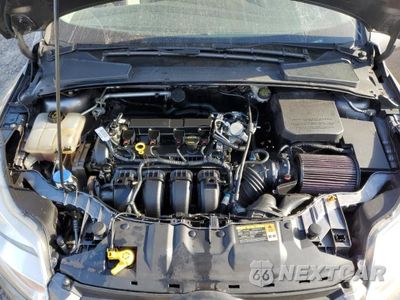 Zdjęcie 11 z 12 samochodu: 2014 FORD FOCUS SE VIN:1FADP3F26EL238079 - miniatura