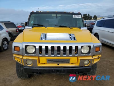 Piąte zdjęcie samochodu w środku: 2003 HUMMER H2 VIN:5GRGN23U53H142830 - miniatura
