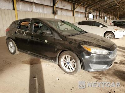 Czwarte zdjęcie samochodu z boku: 2018 FORD FOCUS SE VIN:1FADP3K22JL251640 - miniatura