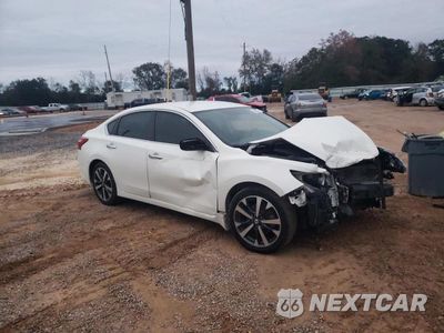 Czwarte zdjęcie samochodu z boku: 2016 NISSAN ALTIMA 2.5 VIN:1N4AL3AP3GC262988 - miniatura