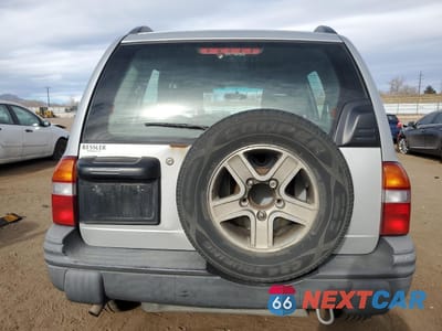 Zdjęcie 6 z 14 samochodu: 2004 CHEVROLET TRACKER VIN:2CNBJ134146918164 - miniatura