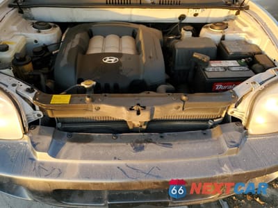 Zdjęcie 13 z 15 samochodu: 2003 HYUNDAI SANTA FE GLS VIN:KM8SC13D93U392375 - miniatura