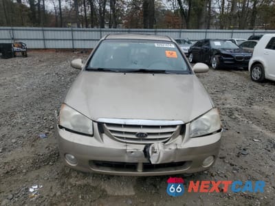 Piąte zdjęcie samochodu w środku: 2004 KIA SPECTRA LX VIN:KNAFE121045029608 - miniatura