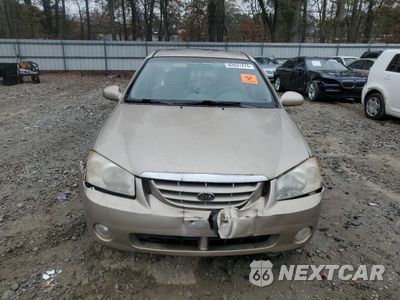 Piąte zdjęcie samochodu w środku: 2004 KIA SPECTRA LX VIN:KNAFE121045029608 - miniatura