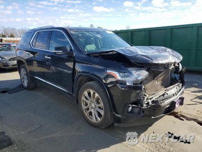 Czwarte zdjęcie samochodu z boku: 2018 CHEVROLET TRAVERSE PREMIER VIN:1GNEVJKW6JJ129068 - miniatura