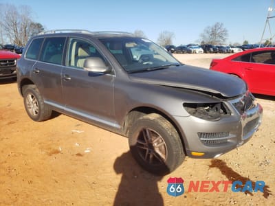 Czwarte zdjęcie samochodu z boku: 2009 VOLKSWAGEN TOUAREG 2 V6 VIN:WVGBE77LX9D015576 - miniatura