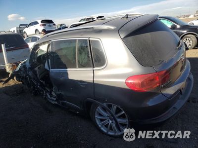 Drugie zdjęcie samochodu z przodu: 2014 VOLKSWAGEN TIGUAN S VIN:WVGBV3AX1EW511093 - miniatura