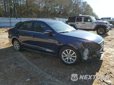 Czwarte zdjęcie samochodu z boku: 2014 VOLKSWAGEN JETTA SE VIN:3VWD07AJ9EM330917 - miniatura