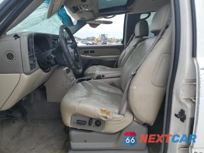 Zdjęcie 7 z 14 samochodu: 2001 GMC YUKON VIN:1GKEC13T31R221666 - miniatura