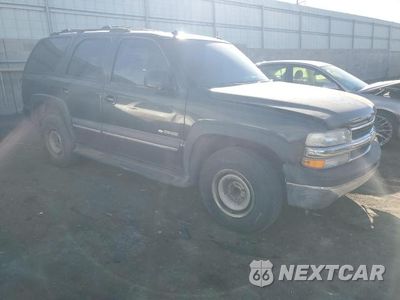 Czwarte zdjęcie samochodu z boku: 2003 CHEVROLET TAHOE C1500 VIN:1GNEC13Z73R288605 - miniatura