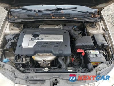 Zdjęcie 11 z 12 samochodu: 2004 KIA SPECTRA LX VIN:KNAFE121045029608 - miniatura