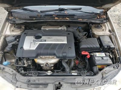Zdjęcie 11 z 12 samochodu: 2004 KIA SPECTRA LX VIN:KNAFE121045029608 - miniatura