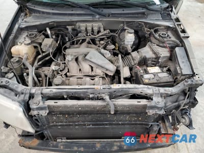 Zdjęcie 12 z 14 samochodu: 2005 MERCURY MARINER VIN:4M2YU56115DJ27306 - miniatura