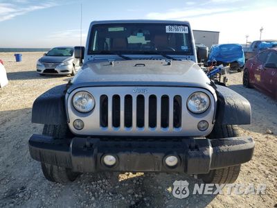 Piąte zdjęcie samochodu w środku: 2015 JEEP WRANGLER UNLIMITED SPORT VIN:1C4HJWDG1FL509077 - miniatura