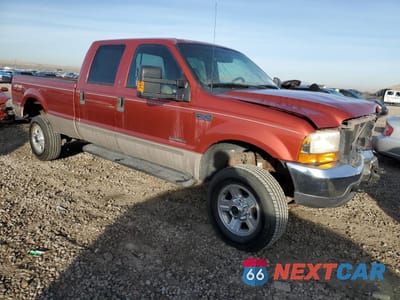 Czwarte zdjęcie samochodu z boku: 1999 FORD F350 SRW SUPER DUTY VIN:1FTSW31F9XEE91077 - miniatura