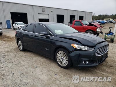 Czwarte zdjęcie samochodu z boku: 2014 FORD FUSION SE PHEV VIN:3FA6P0PU9ER106460 - miniatura