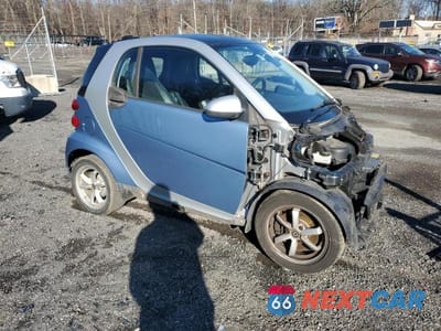 Czwarte zdjęcie samochodu z boku: 2012 SMART FORTWO PURE VIN:WMEEJ3BA7CK528445 - miniatura
