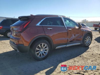 Trzecie zdjęcie samochodu z tyłu: 2021 CADILLAC XT4 PREMIUM LUXURY VIN:1GYFZDR48MF003724 - miniatura