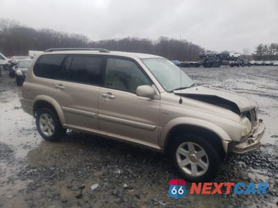 Czwarte zdjęcie samochodu z boku: 2003 SUZUKI XL7 PLUS VIN:JS3TX92V334109931 - miniatura
