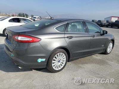 Trzecie zdjęcie samochodu z tyłu: 2016 FORD FUSION SE PHEV VIN:3FA6P0PU3GR229268 - miniatura