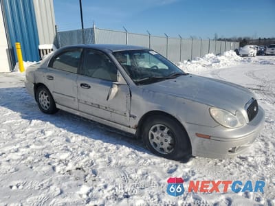 Czwarte zdjęcie samochodu z boku: 2003 HYUNDAI SONATA GL VIN:KMHWF25SX3A748134 - miniatura