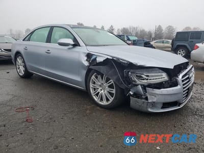 Czwarte zdjęcie samochodu z boku: 2016 AUDI A8 L QUATTRO VIN:WAU34AFD2GN015787 - miniatura
