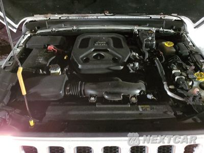 Zdjęcie 13 z 15 samochodu: 2018 JEEP WRANGLER UNLIMITED SAHARA VIN:1C4HJXEN8JW201401 - miniatura