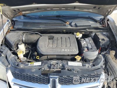 Zdjęcie 12 z 14 samochodu: 2013 DODGE GRAND CARAVAN SE VIN:2C4RDGBG7DR702858 - miniatura