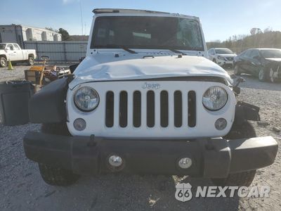 Piąte zdjęcie samochodu w środku: 2016 JEEP WRANGLER UNLIMITED SPORT VIN:1C4BJWDG3GL330773 - miniatura
