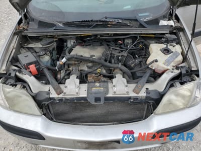 Zdjęcie 12 z 13 samochodu: 2004 CHEVROLET VENTURE VIN:1GNDX03E24D270292 - miniatura