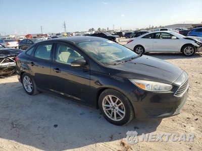 Czwarte zdjęcie samochodu z boku: 2015 FORD FOCUS VIN:1FADP3F23FL213755 - miniatura
