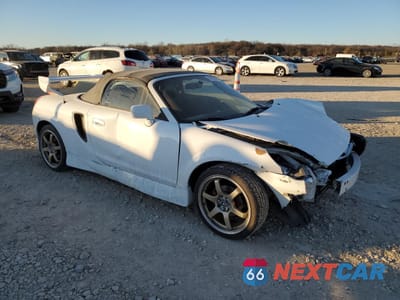 Czwarte zdjęcie samochodu z boku: 2000 TOYOTA MR2 SPYDER VIN:JTDFR3200Y0008173 - miniatura