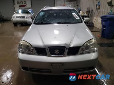 Piąte zdjęcie samochodu w środku: 2005 SUZUKI FORENZA S VIN:KL5JD86ZX5K084620 - miniatura