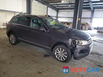 Czwarte zdjęcie samochodu z boku: 2011 VOLKSWAGEN TOUAREG V6 TDI VIN:WVGFK9BP0BD004463 - miniatura