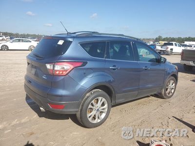 Trzecie zdjęcie samochodu z tyłu: 2018 FORD ESCAPE SE VIN:1FMCU9GD4JUC01551 - miniatura