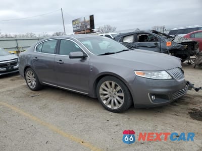 Czwarte zdjęcie samochodu z boku: 2011 LINCOLN MKS VIN:1LNHL9DR4BG612604 - miniatura