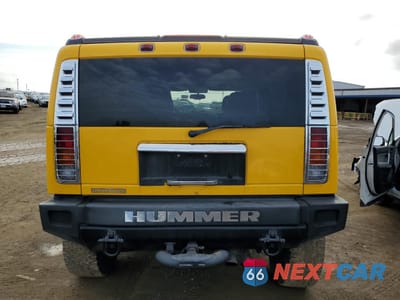 Zdjęcie 6 z 15 samochodu: 2003 HUMMER H2 VIN:5GRGN23U53H142830 - miniatura