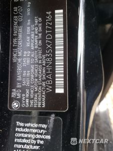 Zdjęcie 12 z 13 samochodu: 2007 BMW 750 VIN:WBAHN835X7DT72164 - miniatura