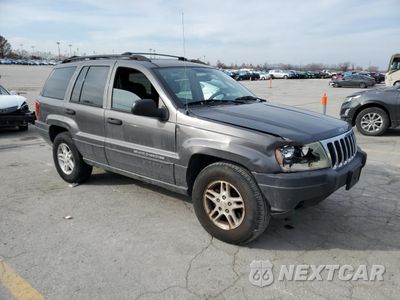 Czwarte zdjęcie samochodu z boku: 2003 JEEP GRAND CHEROKEE LAREDO VIN:1J4GX48N63C559776 - miniatura