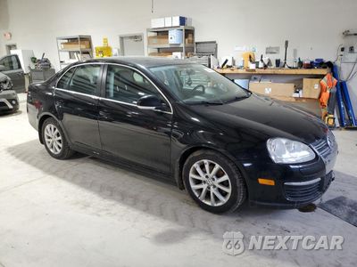 Czwarte zdjęcie samochodu z boku: 2010 VOLKSWAGEN JETTA SE VIN:3VWRZ7AJ1AM045425 - miniatura