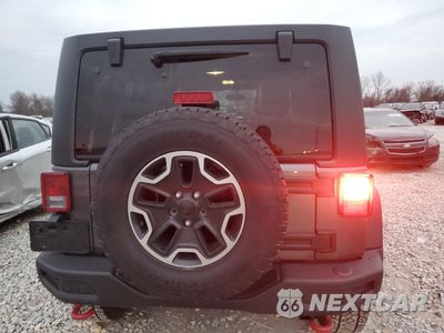 Zdjęcie 6 z 16 samochodu: 2014 JEEP WRANGLER UNLIMITED RUBICON VIN:1C4BJWFG2EL268275 - miniatura