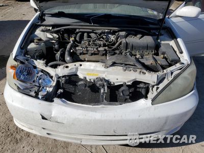 Zdjęcie 13 z 14 samochodu: 2003 TOYOTA CAMRY LE VIN:4T1BF32K83U043985 - miniatura
