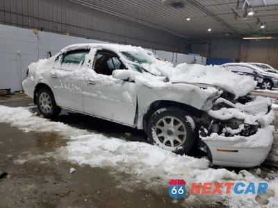 Czwarte zdjęcie samochodu z boku: 1999 CHEVROLET MALIBU LS VIN:1G1NE52J5X6127403 - miniatura