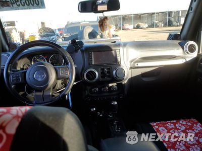 Zdjęcie 8 z 14 samochodu: 2012 JEEP WRANGLER UNLIMITED RUBICON VIN:1C4HJWFG2CL260944 - miniatura