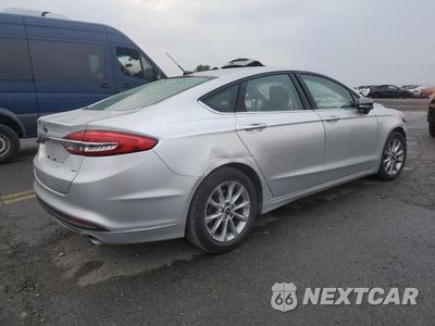 Trzecie zdjęcie samochodu z tyłu: 2017 FORD FUSION SE VIN:3FA6P0H73HR391007 - miniatura