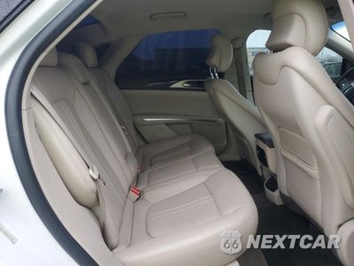 Zdjęcie 11 z 13 samochodu: 2016 LINCOLN MKZ VIN:3LN6L2G93GR626181 - miniatura