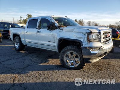 Czwarte zdjęcie samochodu z boku: 2018 GMC SIERRA K1500 SLT VIN:3GTU2NEC7JG641154 - miniatura