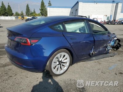 Trzecie zdjęcie samochodu z tyłu: 2023 TESLA MODEL 3 VIN:5YJ3E1EA2PF698175 - miniatura