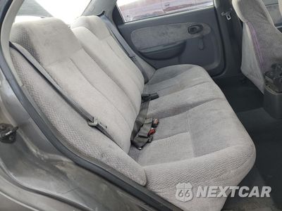 Zdjęcie 10 z 13 samochodu: 2003 KIA SPECTRA BASE VIN:KNAFB121835264507 - miniatura