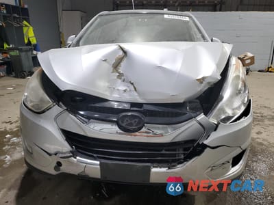 Piąte zdjęcie samochodu w środku: 2010 HYUNDAI TUCSON GLS VIN:KM8JU3AC7AU102873 - miniatura